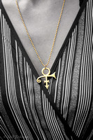 Prince: Gold Love Symbol With Dress